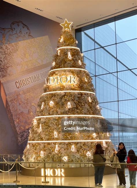 gold christmas tree in church with dior store|Christian Dior Around the World Christmas tree at the top of the .